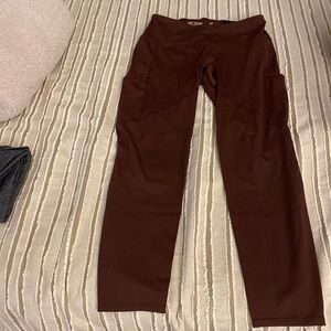 Arc’teryx size small leggings in a dark burgundy color